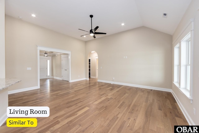 172 Charleston Dr Lot 163, Grandy, NC 27939 - unfurnished living room with ceiling fan, arched walkways, light wood-type flooring, lofted ceiling, and recessed lighting