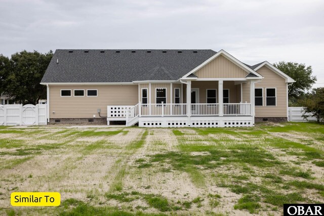 172 Charleston Dr Lot 163, Grandy, NC 27939 - back of property featuring crawl space, roof with shingles, and covered porch