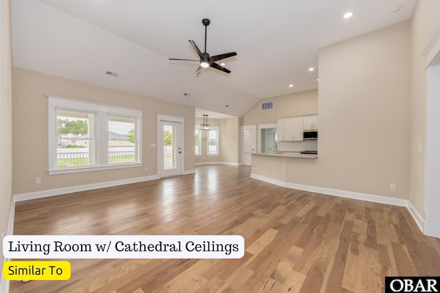 172 Charleston Dr Lot 163, Grandy, NC 27939 - unfurnished living room featuring a ceiling fan, light wood finished floors, lofted ceiling, and recessed lighting