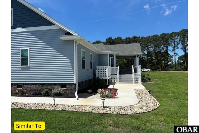 172 Charleston Dr Lot 163, Grandy, NC 27939 - view of side of property with a yard and crawl space