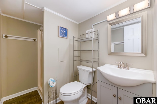 bathroom with vanity, a shower with curtain, wood finished floors, ornamental molding, and toilet