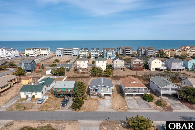 aerial view with a residential view and a water view