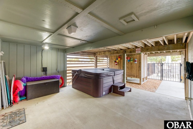 garage with wood walls