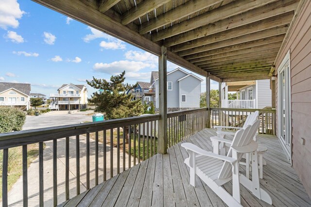 wooden terrace with a residential view