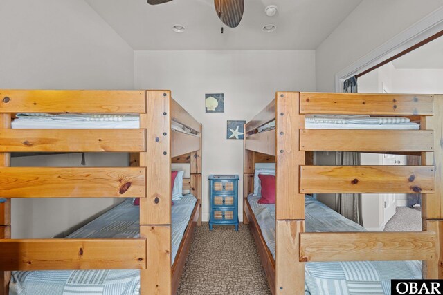 carpeted bedroom with a ceiling fan