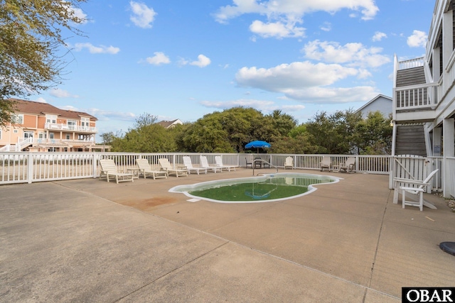 851 Corolla Dr Lot 59, Corolla, NC 27927 - view of swimming pool featuring a patio, fence, and a fenced in pool