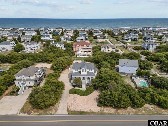 aerial view featuring a residential view and a water view