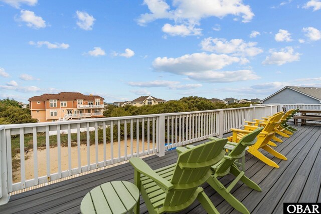 wooden deck featuring a residential view