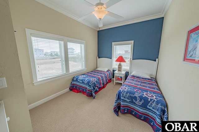 24280 NC Highway 12 Unit 2A, Rodanthe, NC 27968 - bedroom with carpet floors, ornamental molding, baseboards, and ceiling fan