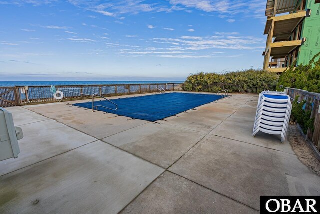 24280 NC Highway 12 Unit 2A, Rodanthe, NC 27968 - pool with a water view and a patio