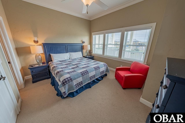 24280 NC Highway 12 Unit 2A, Rodanthe, NC 27968 - bedroom featuring crown molding, a ceiling fan, baseboards, and carpet