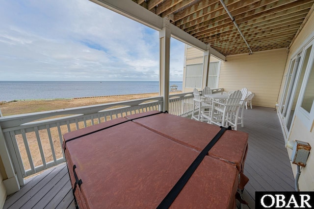24280 NC Highway 12 Unit 2A, Rodanthe, NC 27968 - balcony featuring a beach view, outdoor dining space, and a deck with water view