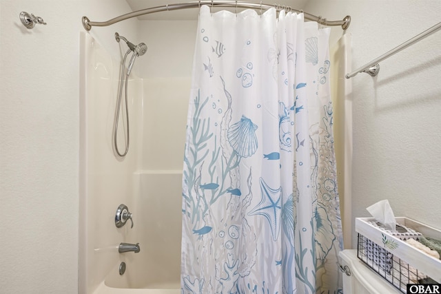 1700 Paget Rd Unit B3, Kill Devil Hills, NC 27948 - bathroom featuring shower / bath combo with shower curtain and toilet
