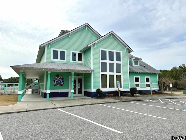 1700 Paget Rd Unit B3, Kill Devil Hills, NC 27948 - view of building exterior with uncovered parking