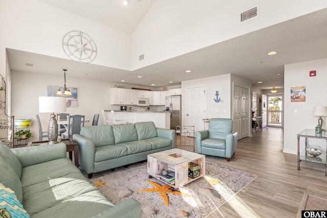 1700 Paget Rd Unit B3, Kill Devil Hills, NC 27948 - living room with light wood-style floors, recessed lighting, and baseboards