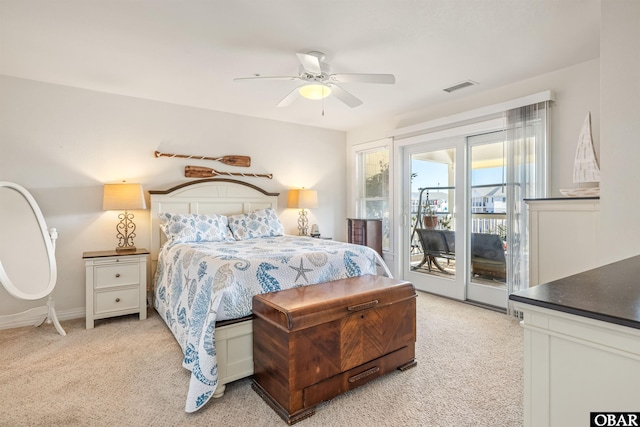 1700 Paget Rd Unit B3, Kill Devil Hills, NC 27948 - bedroom featuring access to exterior, light carpet, a ceiling fan, and baseboards