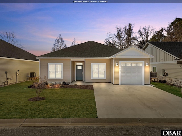 view of front facade featuring board and batten siding, central air condition unit, concrete driveway, a front yard, and a garage