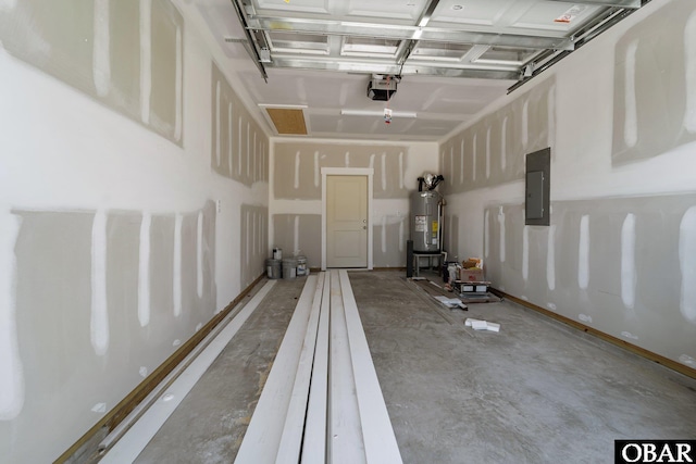 garage featuring electric panel, water heater, and a garage door opener