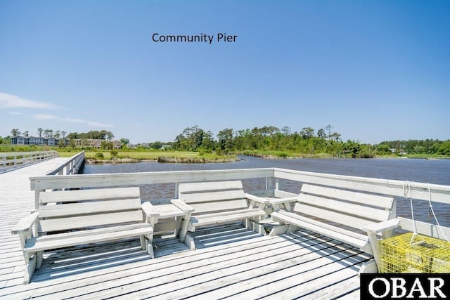 deck featuring a water view