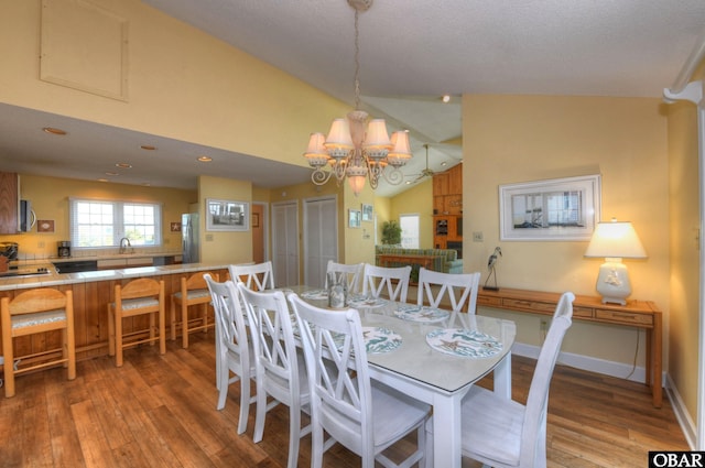 1278 Duck Rd Lot # 51Sh # 4, Duck, NC 27949 - dining space with light wood finished floors, lofted ceiling, a chandelier, recessed lighting, and baseboards