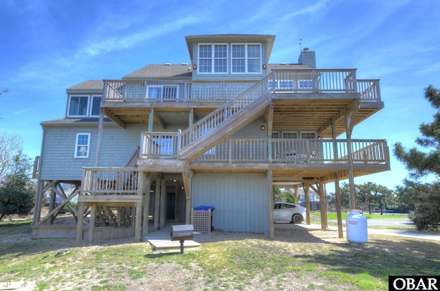 1278 Duck Rd Lot # 51Sh # 4, Duck, NC 27949 - back of house with stairs, a deck, and a chimney