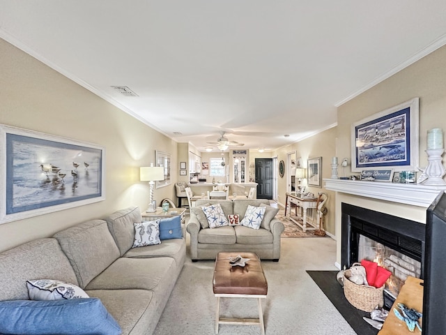 123 Pirates Way Unit # 123A, Manteo, NC 27954 - living room featuring ornamental molding, ceiling fan, light colored carpet, and a fireplace with flush hearth