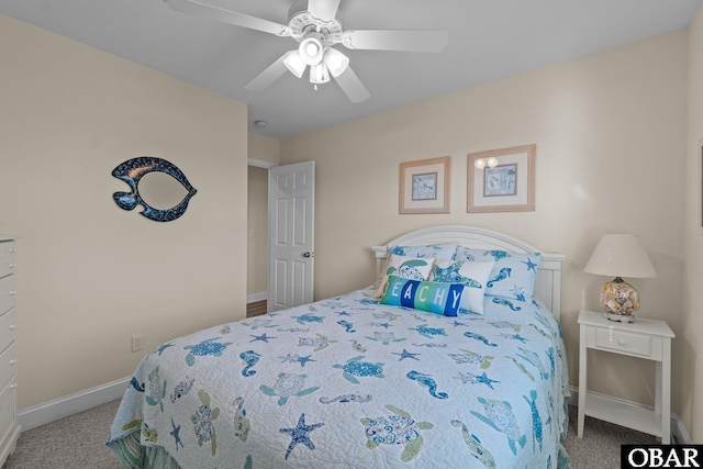 carpeted bedroom featuring a ceiling fan and baseboards