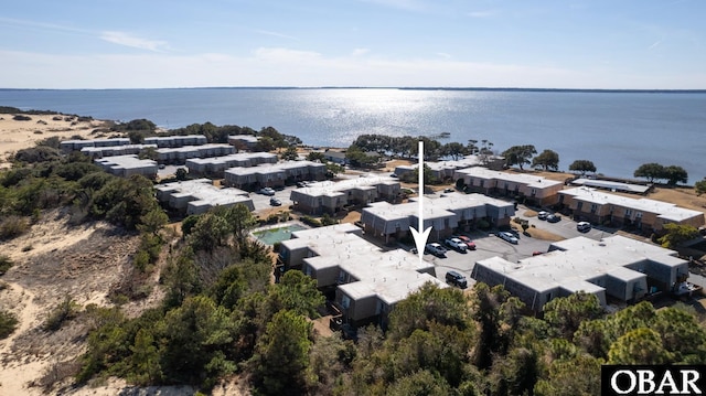 bird's eye view with a water view