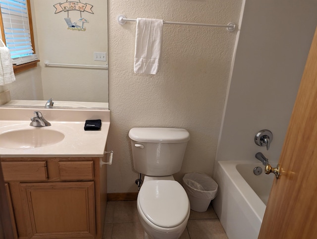 bathroom with baseboards, toilet, tile patterned flooring, bathtub / shower combination, and vanity