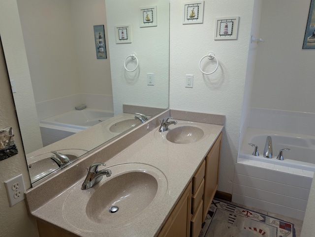 bathroom featuring double vanity and a sink