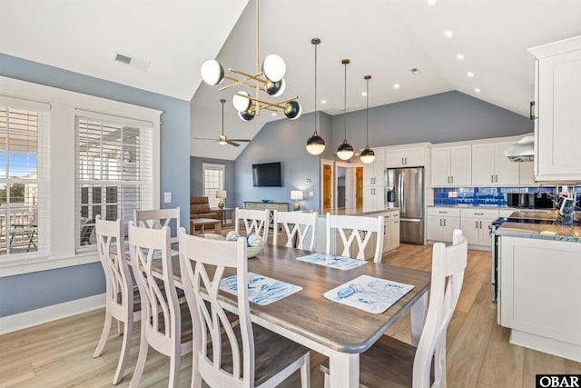 1726 Bobby Lee Trl Lot 5, Kill Devil Hills, NC 27948 - dining room featuring a chandelier, light wood-type flooring, a ceiling fan, high vaulted ceiling, and recessed lighting