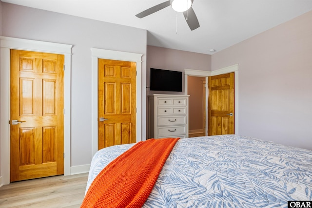1726 Bobby Lee Trl Lot 5, Kill Devil Hills, NC 27948 - bedroom featuring light wood-type flooring, a ceiling fan, and baseboards