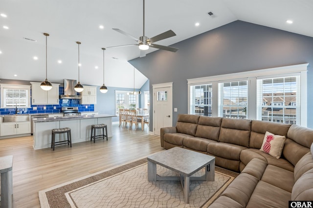 1726 Bobby Lee Trl Lot 5, Kill Devil Hills, NC 27948 - living area with light wood-style flooring, ceiling fan, high vaulted ceiling, and recessed lighting