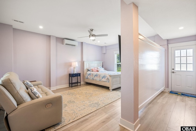 1726 Bobby Lee Trl Lot 5, Kill Devil Hills, NC 27948 - bedroom featuring a wall unit AC, light wood-style floors, baseboards, recessed lighting, and a ceiling fan