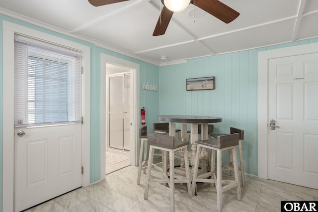 dining area featuring marble finish floor and a ceiling fan