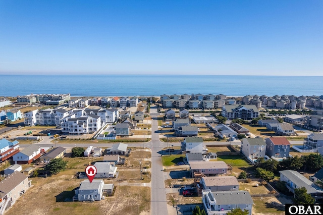 bird's eye view with a water view and a residential view