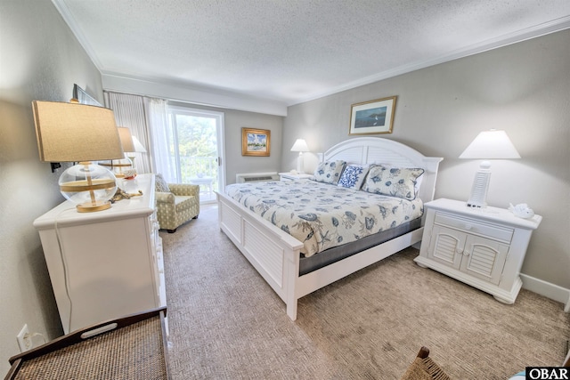 58822 Marina Way Unit 208, Hatteras, NC 27943 - bedroom featuring a textured ceiling, ornamental molding, and light colored carpet