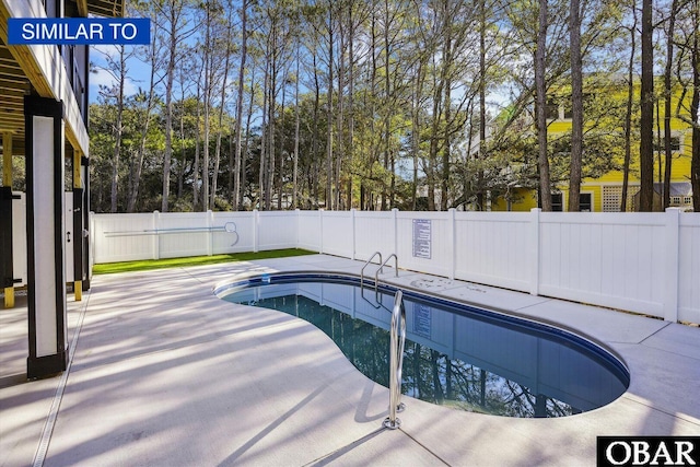 887 Marsh Lndg Lot # 249, Corolla, NC 27927 - view of swimming pool with a fenced backyard, a patio, and view of scattered trees