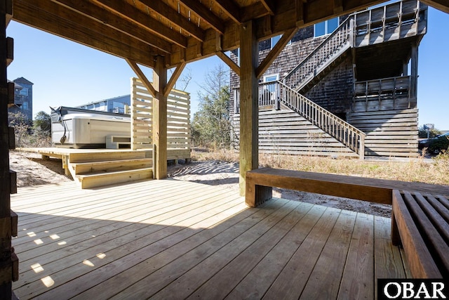 wooden terrace featuring stairs