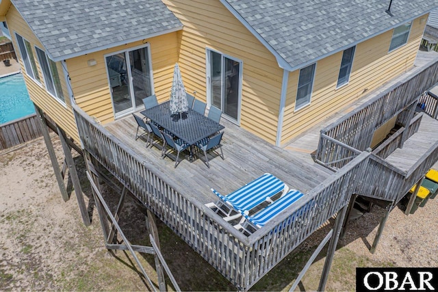 756 Mariner Dr Lot 2, Corolla, NC 27927 - rear view of property featuring roof with shingles, outdoor dining area, a deck, and stairs