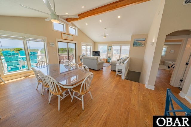 25259 Sea Isle Hills Dr Lot 7, Waves, NC 27982 - dining room featuring a ceiling fan, arched walkways, beam ceiling, light wood-type flooring, and high vaulted ceiling