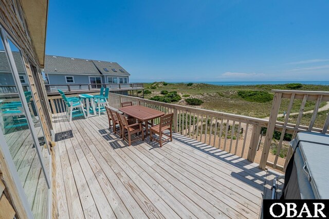 25259 Sea Isle Hills Dr Lot 7, Waves, NC 27982 - wooden terrace with outdoor dining space and a water view
