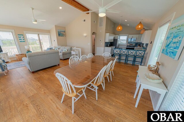 25259 Sea Isle Hills Dr Lot 7, Waves, NC 27982 - dining room featuring a ceiling fan, light wood finished floors, beamed ceiling, healthy amount of natural light, and high vaulted ceiling