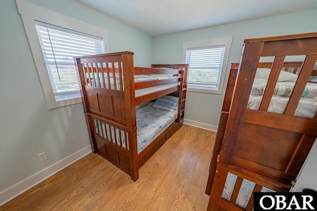 25259 Sea Isle Hills Dr Lot 7, Waves, NC 27982 - bedroom featuring light wood-type flooring and baseboards