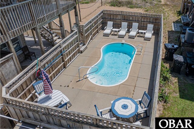 25259 Sea Isle Hills Dr Lot 7, Waves, NC 27982 - view of pool featuring a patio area, stairway, and cooling unit
