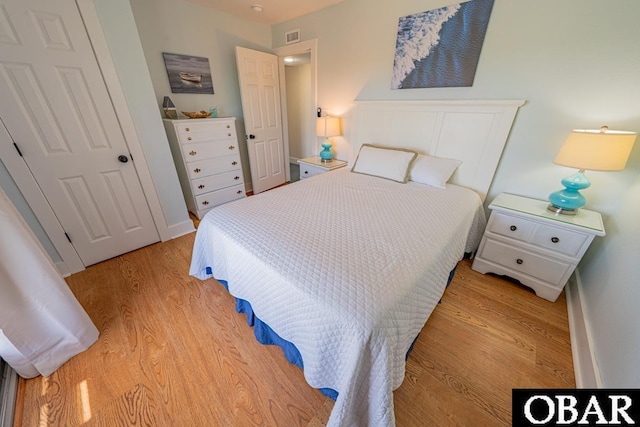 25259 Sea Isle Hills Dr Lot 7, Waves, NC 27982 - bedroom with light wood finished floors