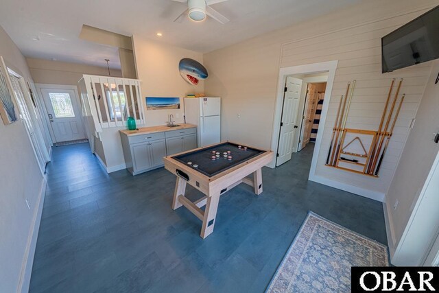 25259 Sea Isle Hills Dr Lot 7, Waves, NC 27982 - recreation room with ceiling fan, baseboards, dark floors, a sink, and recessed lighting