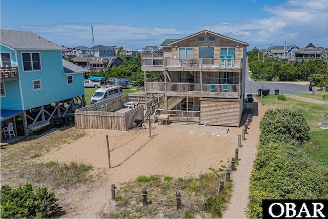 25259 Sea Isle Hills Dr Lot 7, Waves, NC 27982 - rear view of house with a residential view and stairway