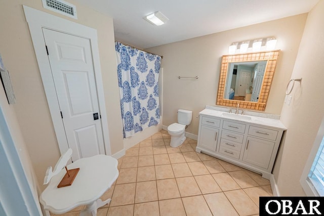 25259 Sea Isle Hills Dr Lot 7, Waves, NC 27982 - bathroom featuring toilet, vanity, tile patterned flooring, and baseboards