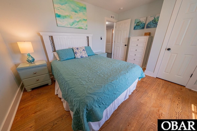 25259 Sea Isle Hills Dr Lot 7, Waves, NC 27982 - bedroom featuring light wood-style flooring and baseboards